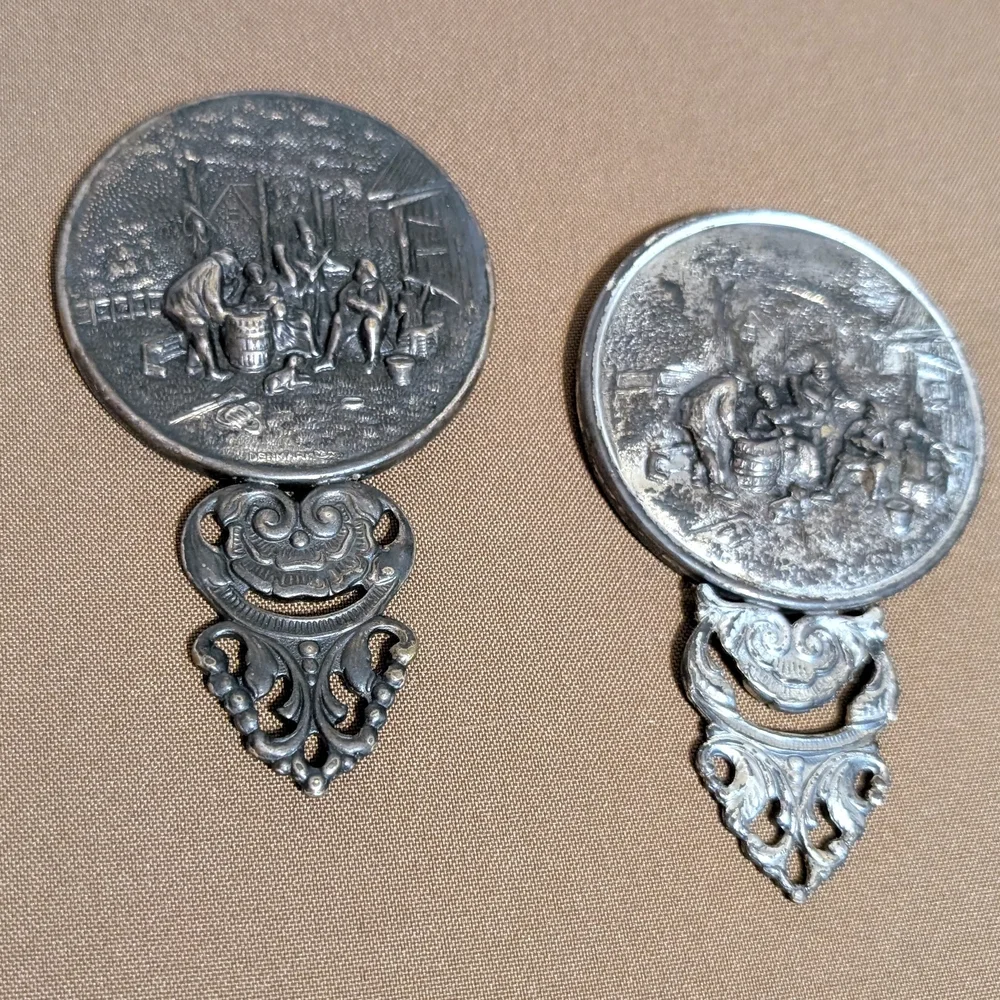 Vintage Silver Hand Mirror with Intricate Design